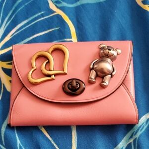 Coach card case with pins